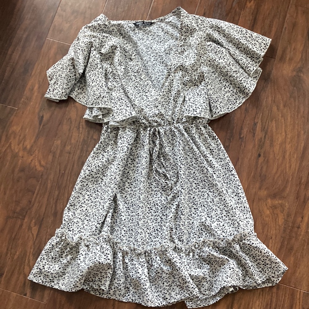 Black and white floral ruffle dress